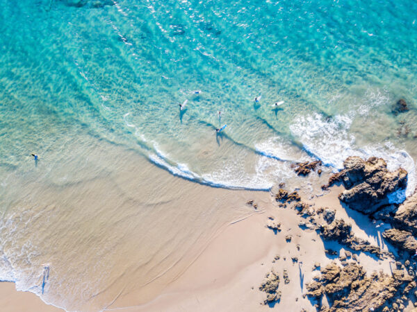 The Pass and Wategoes Beach at Byron Bay from an aerial view wit