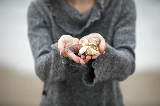 Hands with shells